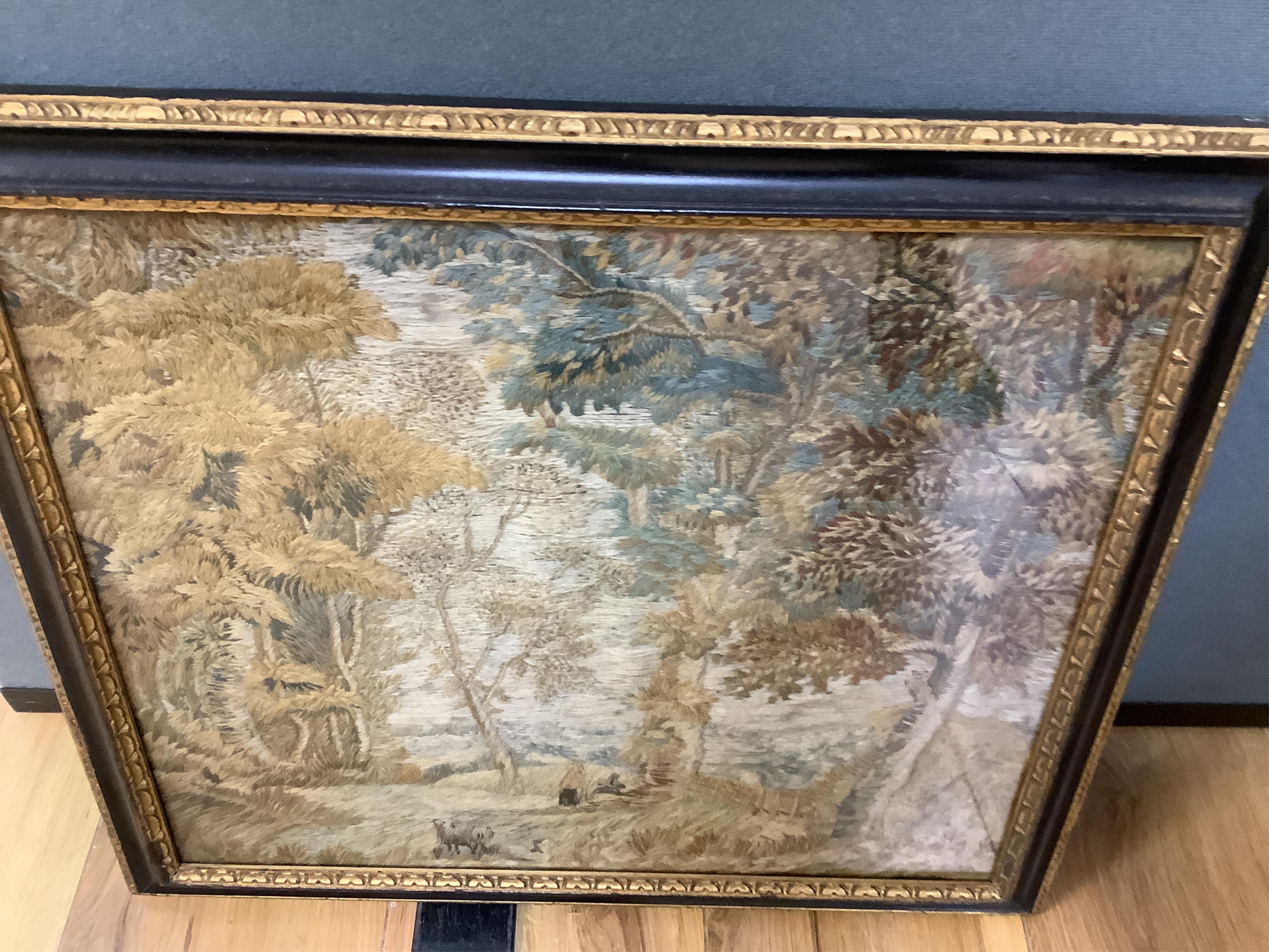 A 19th century heavily embroidered wool work of a figure and dog in a wooded landscape - 38cm x 33cm, together with smaller wool work of figures by a house. Condition - both are still strong in colour without damage.
